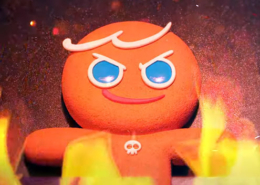 인상을 찌뿌린 서양 쿠키 인형이 불에서 구워지고 있다